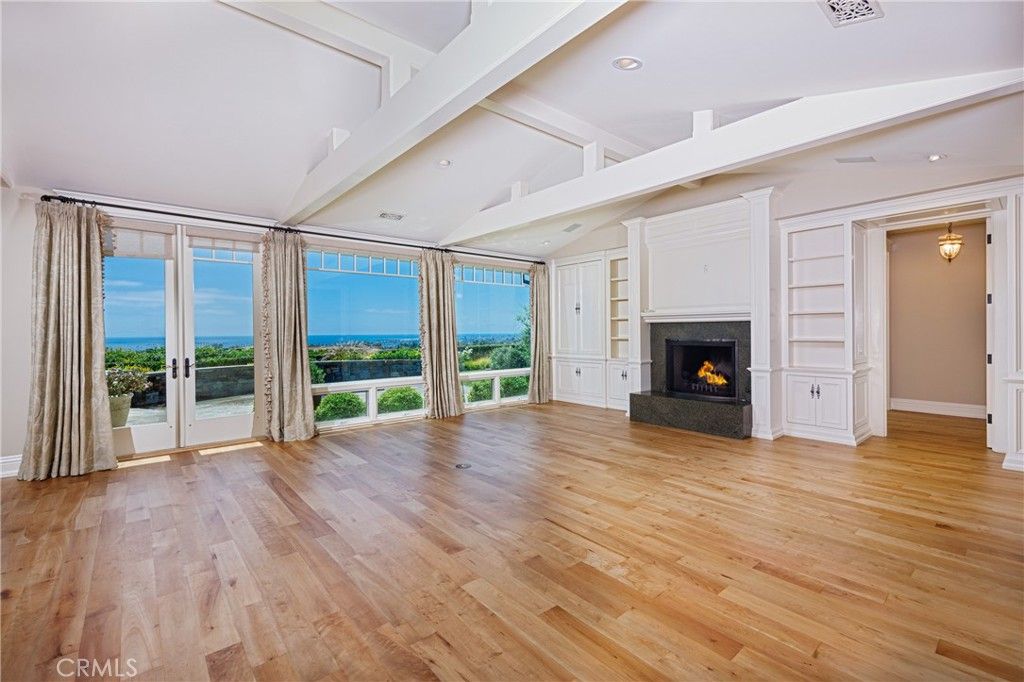 Empty room, Fireplace, Interior, Recessed Lighting, Water, Wood Texture Flooring