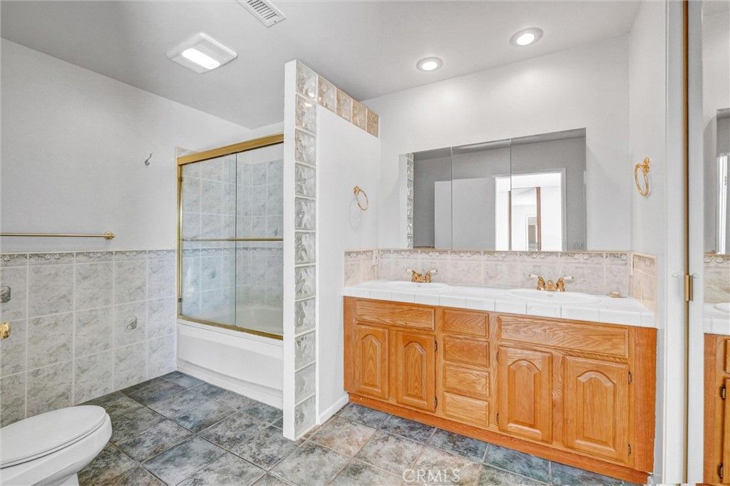 Bathroom, Dual Sink Vanities, Glass Shower, Interior, Recessed Lighting, Tile Countertops