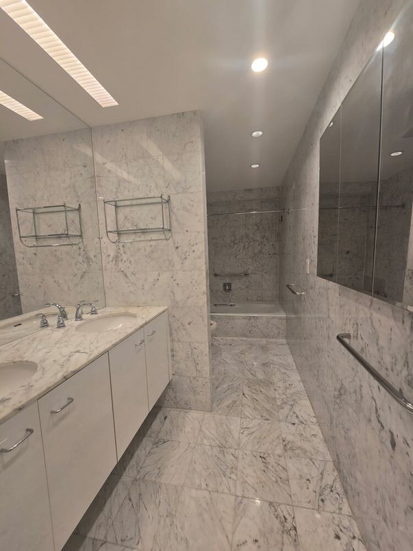 Bathroom, Dual Sink Vanities, Glass Shower, Interior, Marble, Marble Walls, Recessed Lighting