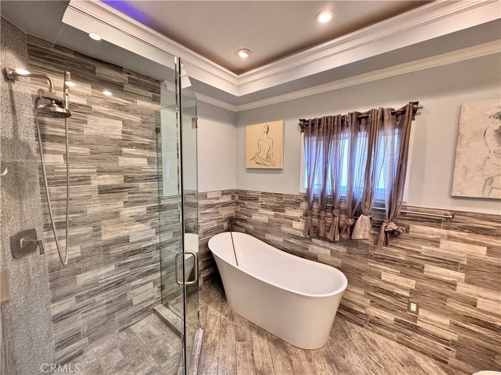 Bathroom, Free Standing Baths, Glass Shower, Interior, Recessed Lighting, Wood Texture Flooring