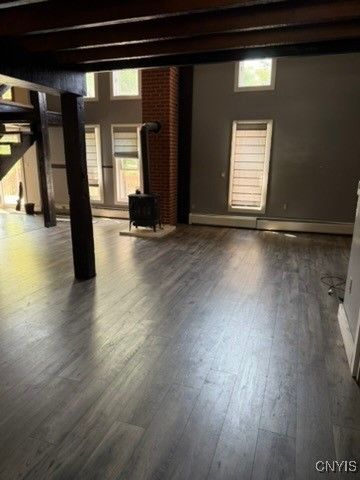 Empty room, Fireplace, Interior, Stone Walls, Wooden Beams, Wood Texture Flooring