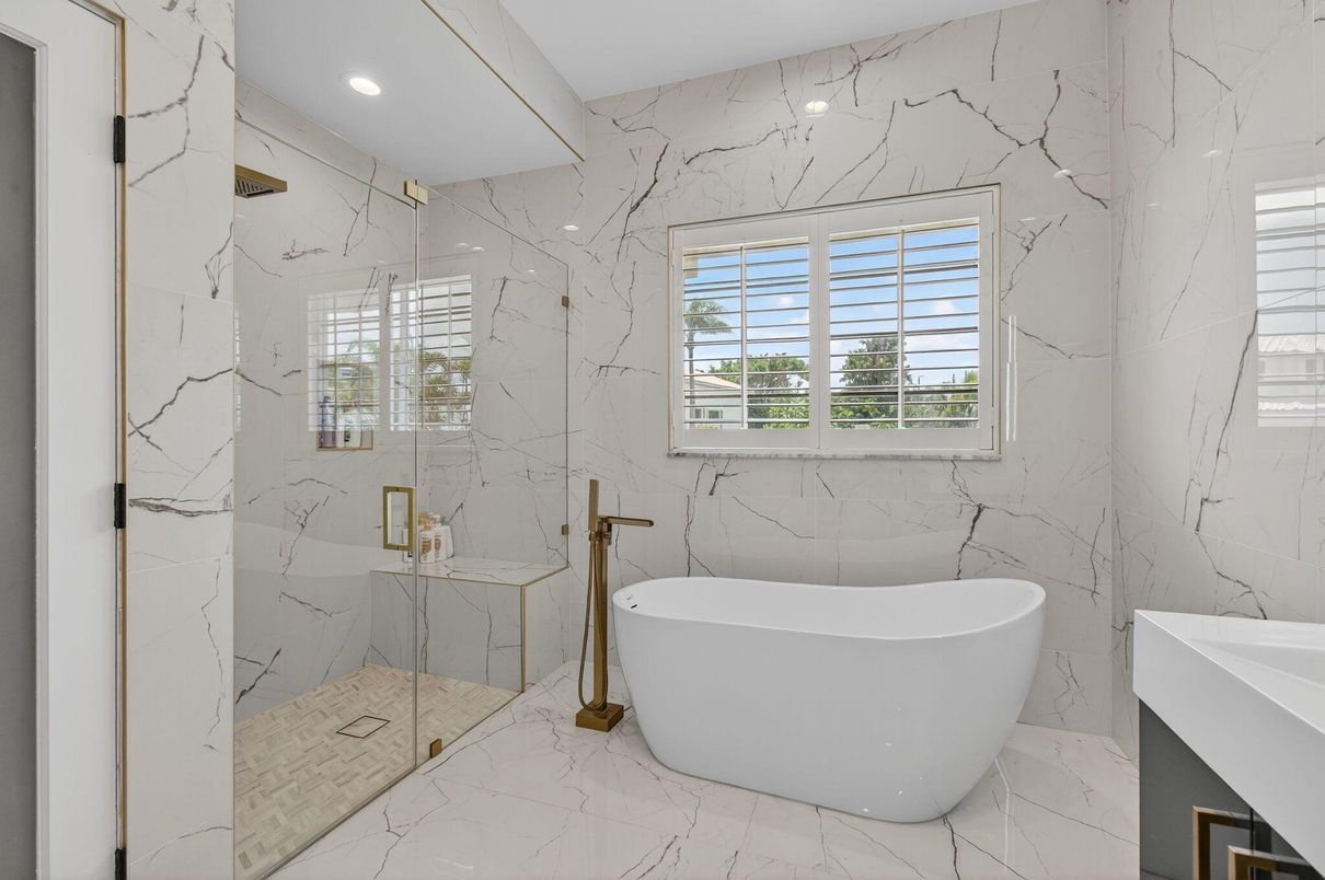 Bathroom, Free Standing Baths, Glass Shower, Interior, Marble, Marble Walls, Recessed Lighting