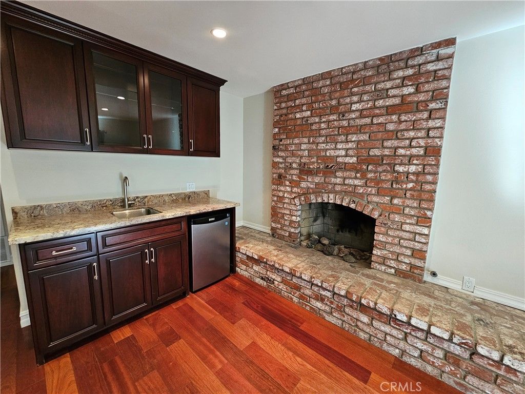 Fireplace, Interior, Recessed Lighting, Stone Walls, Wood Texture Flooring