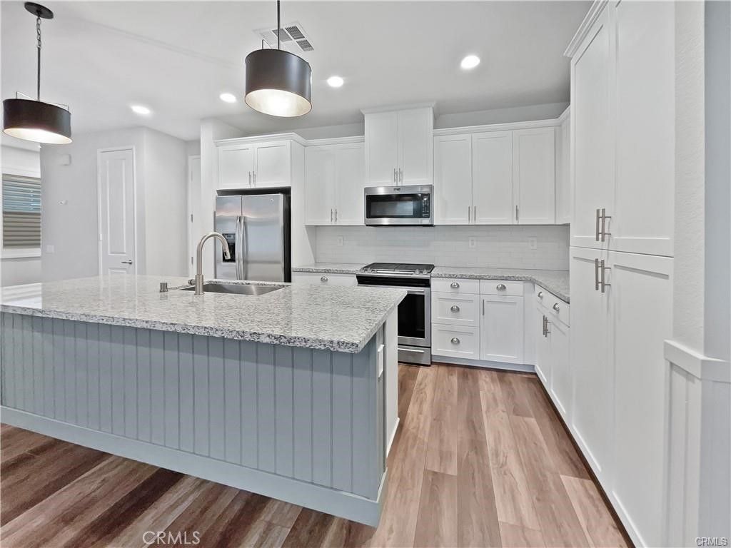 Interior, Kitchen, Pendant Lights, Recessed Lighting, Stainless Steel Appliances, Wood Texture Flooring