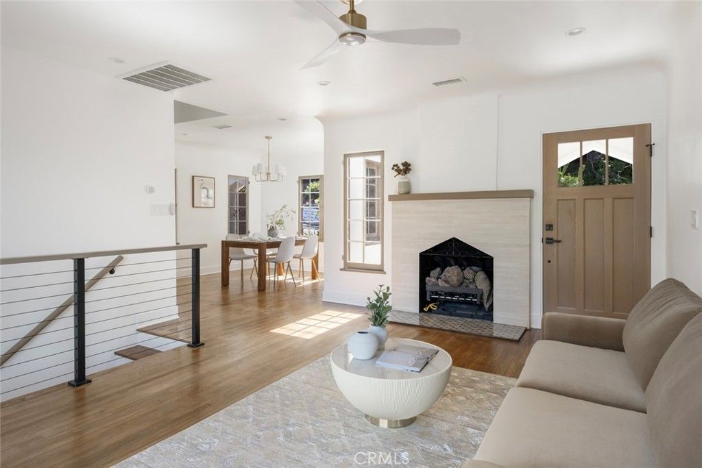 Chandelier, Dining room, Fireplace, Interior, Living room, Recessed Lighting, Wood Texture Flooring