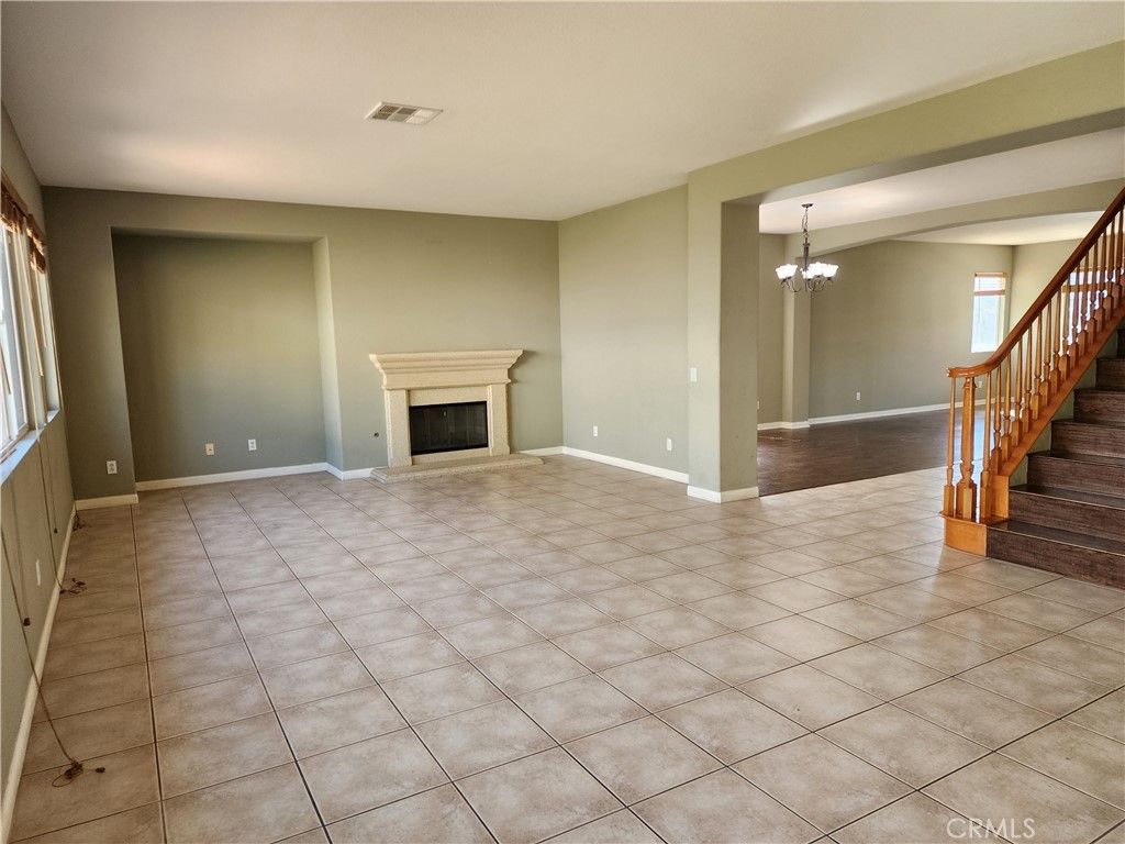 Chandelier, Empty room, Fireplace, Interior