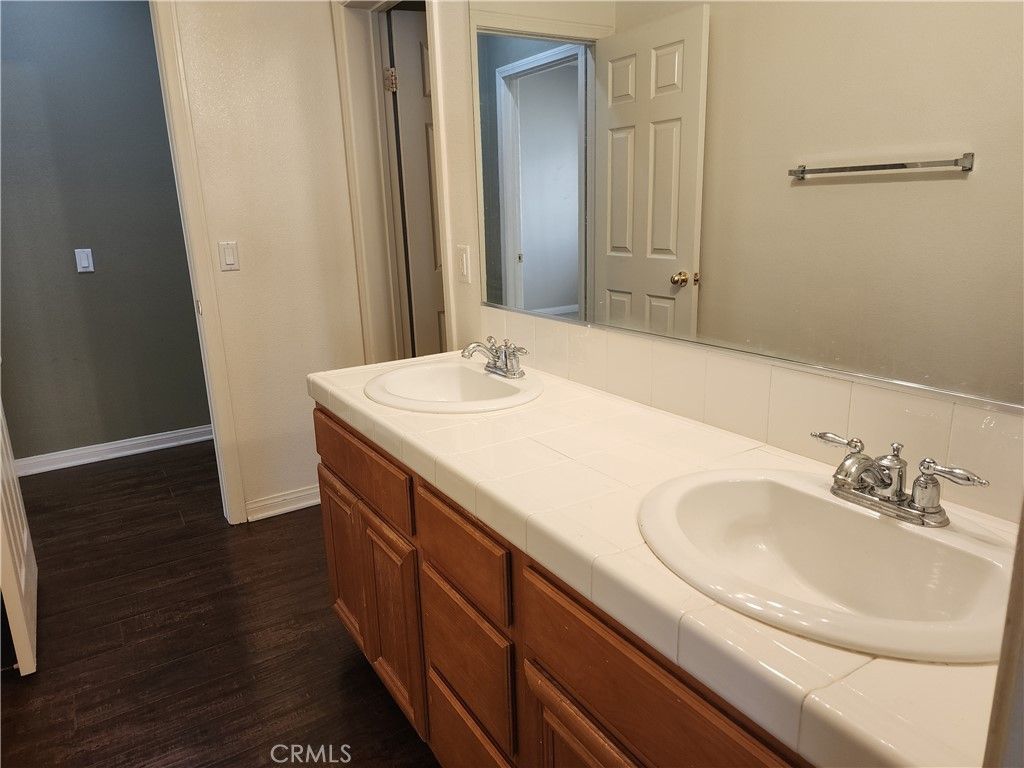 Bathroom, Dual Sink Vanities, Interior, Tile Countertops, Wood Texture Flooring