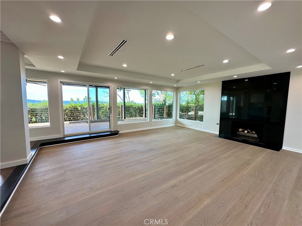 Empty room, Fireplace, Interior, Recessed Lighting, Wood Texture Flooring