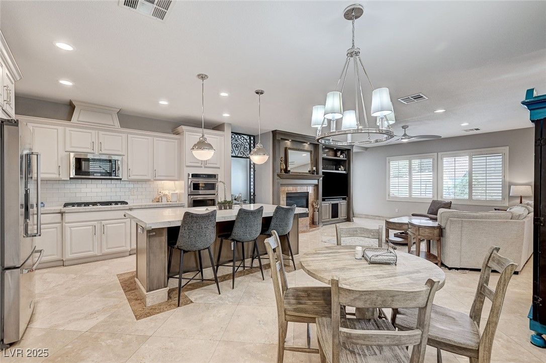 Dining room, Fireplace, Interior, Kitchen, Living room, Pendant Lights, Recessed Lighting, Stainless Steel Appliances