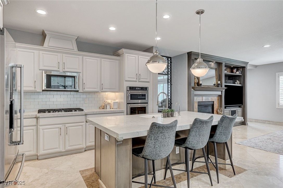 Fireplace, Interior, Kitchen, Pendant Lights, Recessed Lighting, Stainless Steel Appliances