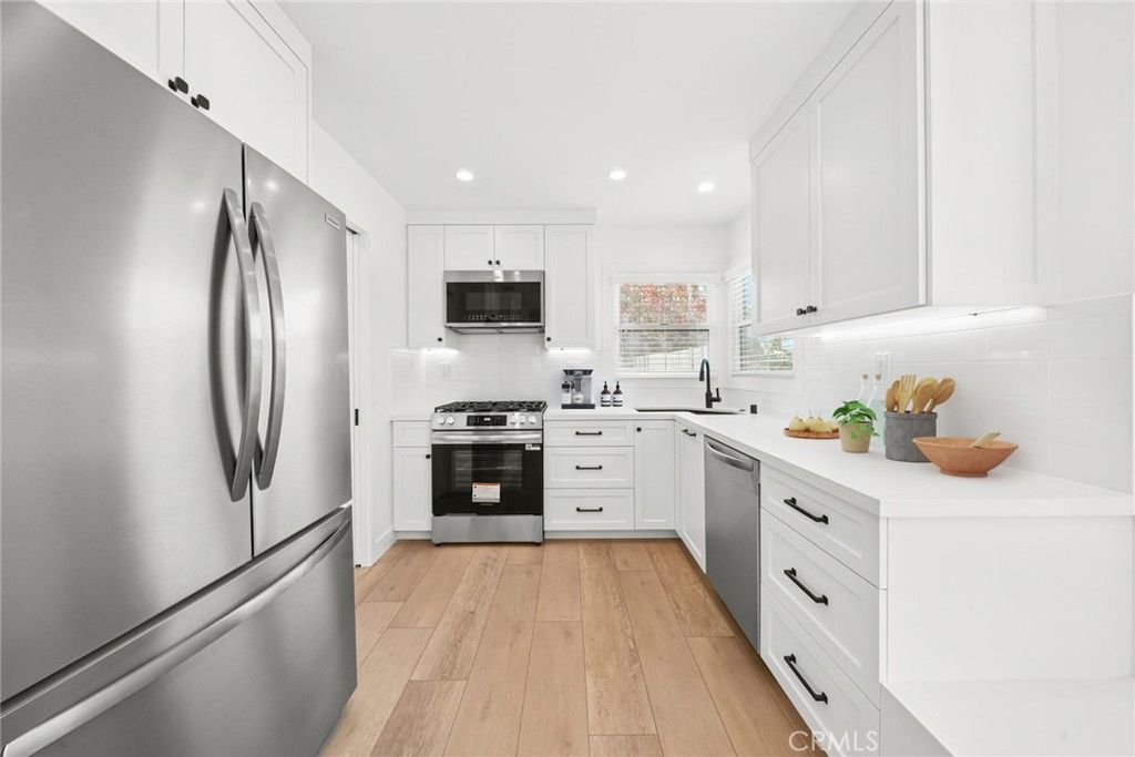 Interior, Kitchen, Recessed Lighting, Stainless Steel Appliances, Wood Texture Flooring