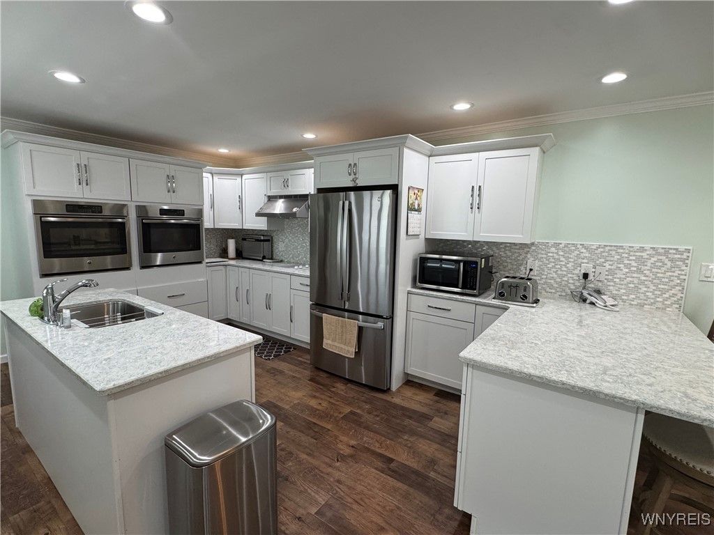 Interior, Kitchen, Recessed Lighting, Stainless Steel Appliances, Wood Texture Flooring