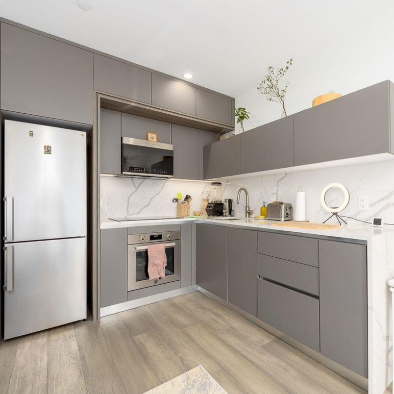 Interior, Kitchen, Marble Walls, Recessed Lighting, Stainless Steel Appliances, Wood Texture Flooring