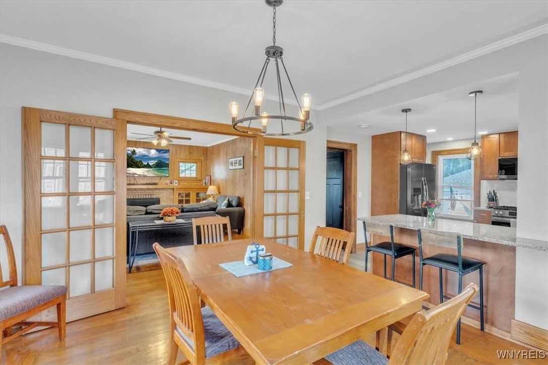 Dining room, Fireplace, Interior, Kitchen, Living room, Pendant Lights, Recessed Lighting, Wood Texture Flooring, Wooden Walls