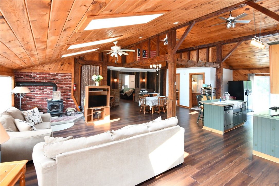Dining room, Fireplace, Interior, Living room, Stone Walls, Wooden Beams, Wooden Ceilings, Wood Texture Flooring