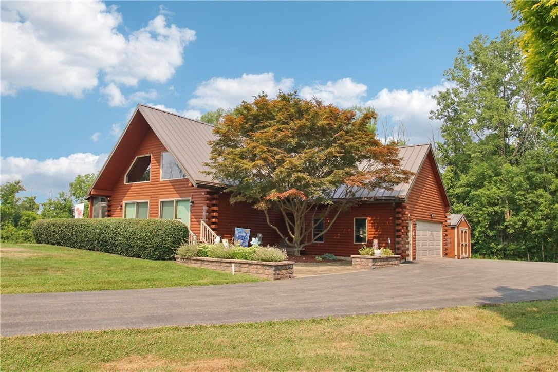 Attached, Backyard, Exterior, Facade, Brick Facade, Log Home