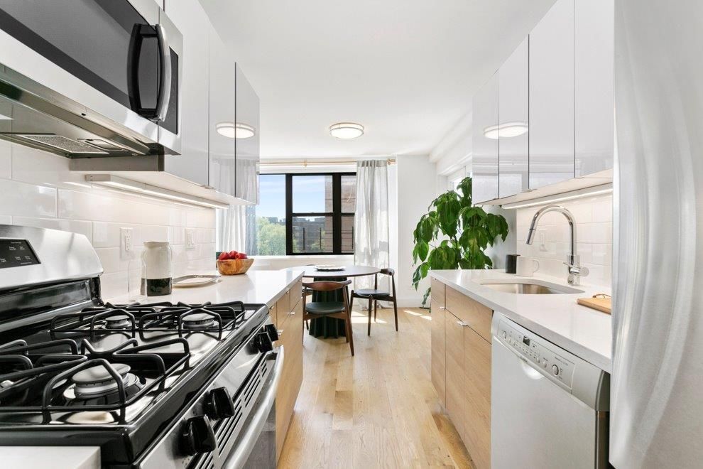 Dining room, Interior, Kitchen, Pendant Lights, Stainless Steel Appliances, Wood Texture Flooring