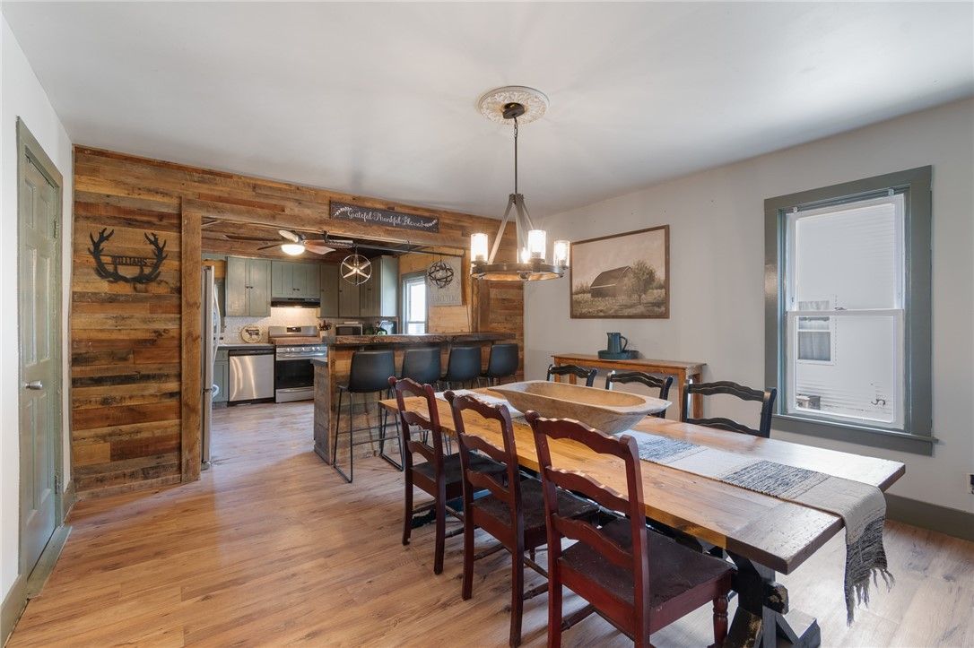 Dining room, Interior, Kitchen, Pendant Lights, Stainless Steel Appliances, Wood Texture Flooring, Wooden Walls