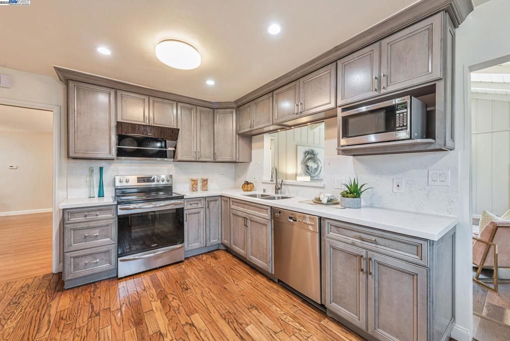 Interior, Kitchen, Recessed Lighting, Stainless Steel Appliances, Wood Texture Flooring