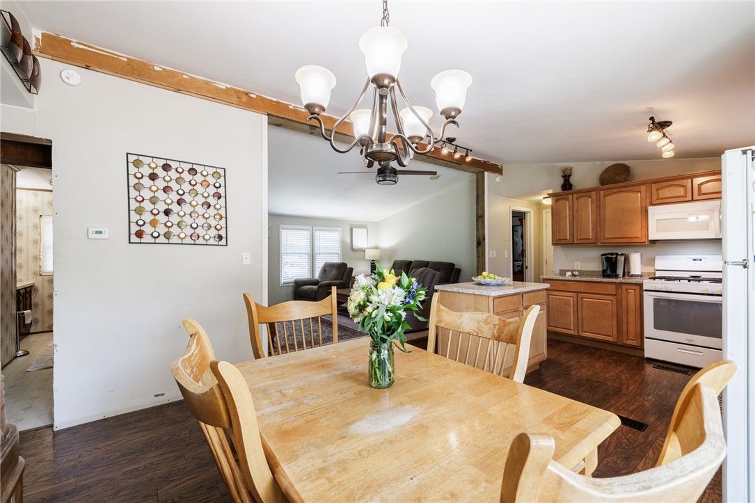 Chandelier, Dining room, Interior, Kitchen, Living room, Stainless Steel Appliances, Wood Texture Flooring