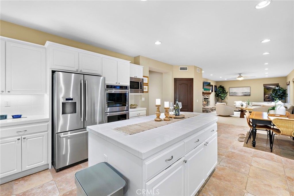 Dining room, Interior, Kitchen, Living room, Recessed Lighting, Stainless Steel Appliances, Tile Countertops