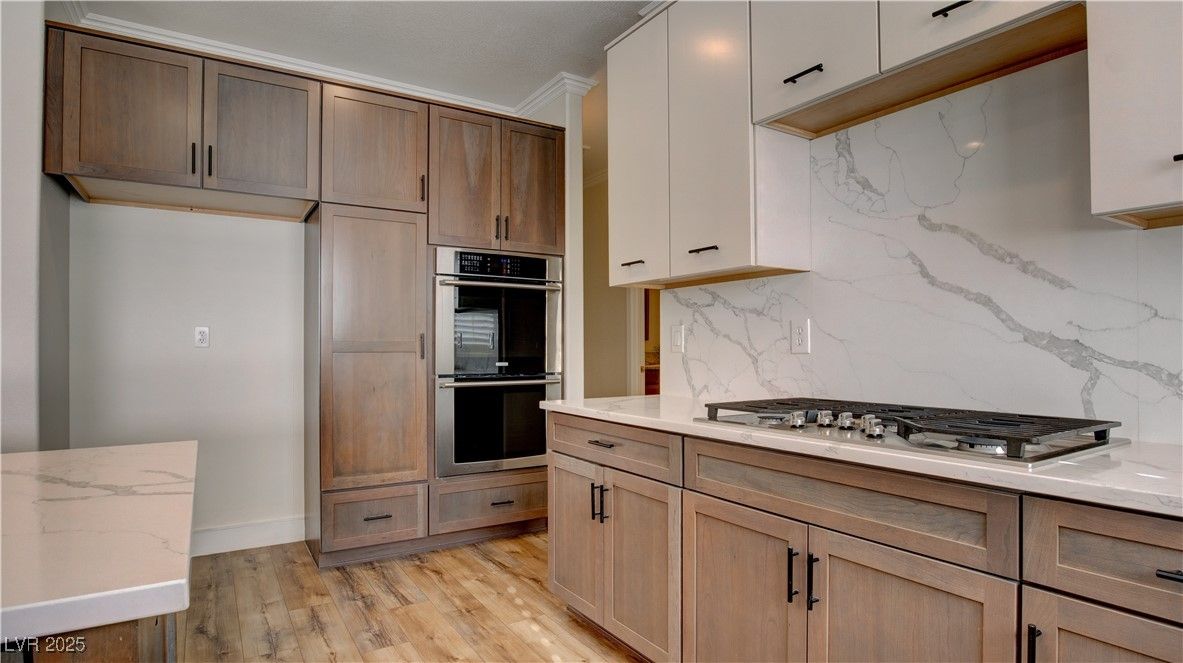 Interior, Kitchen, Marble Walls, Stainless Steel Appliances, Wood Texture Flooring