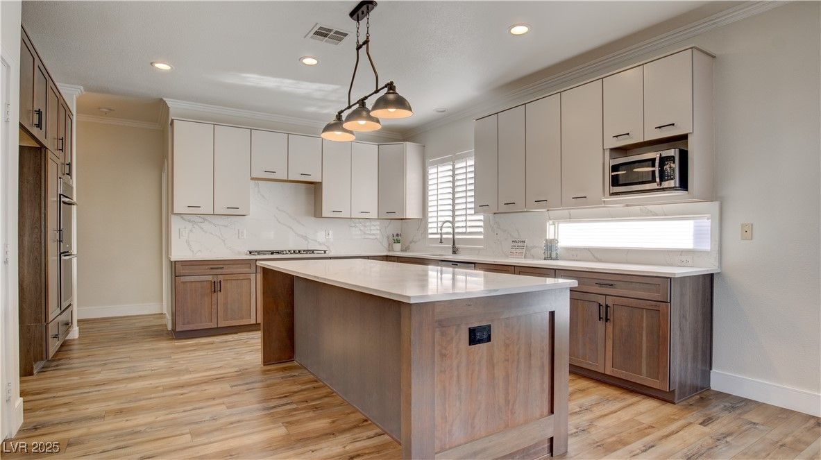 Interior, Kitchen, Marble Walls, Pendant Lights, Recessed Lighting, Wood Texture Flooring