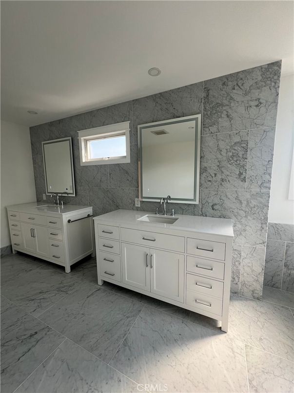 Bathroom, Dual Sink Vanities, Interior, Marble, Marble Walls, Recessed Lighting