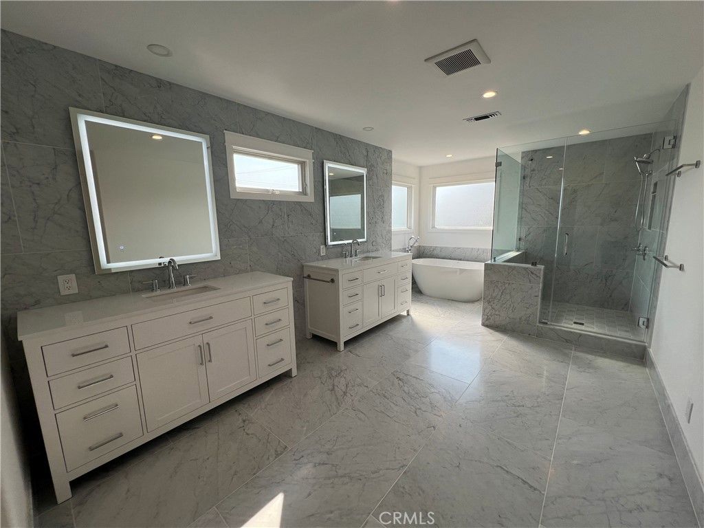 Bathroom, Dual Sink Vanities, Free Standing Baths, Glass Shower, Interior, Marble, Marble Walls, Recessed Lighting