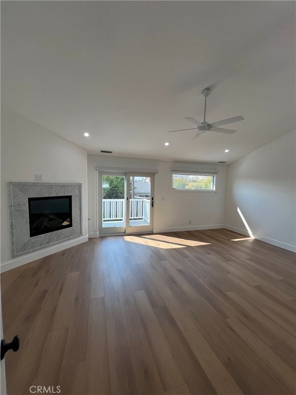Empty room, Fireplace, Interior, Recessed Lighting, Wood Texture Flooring