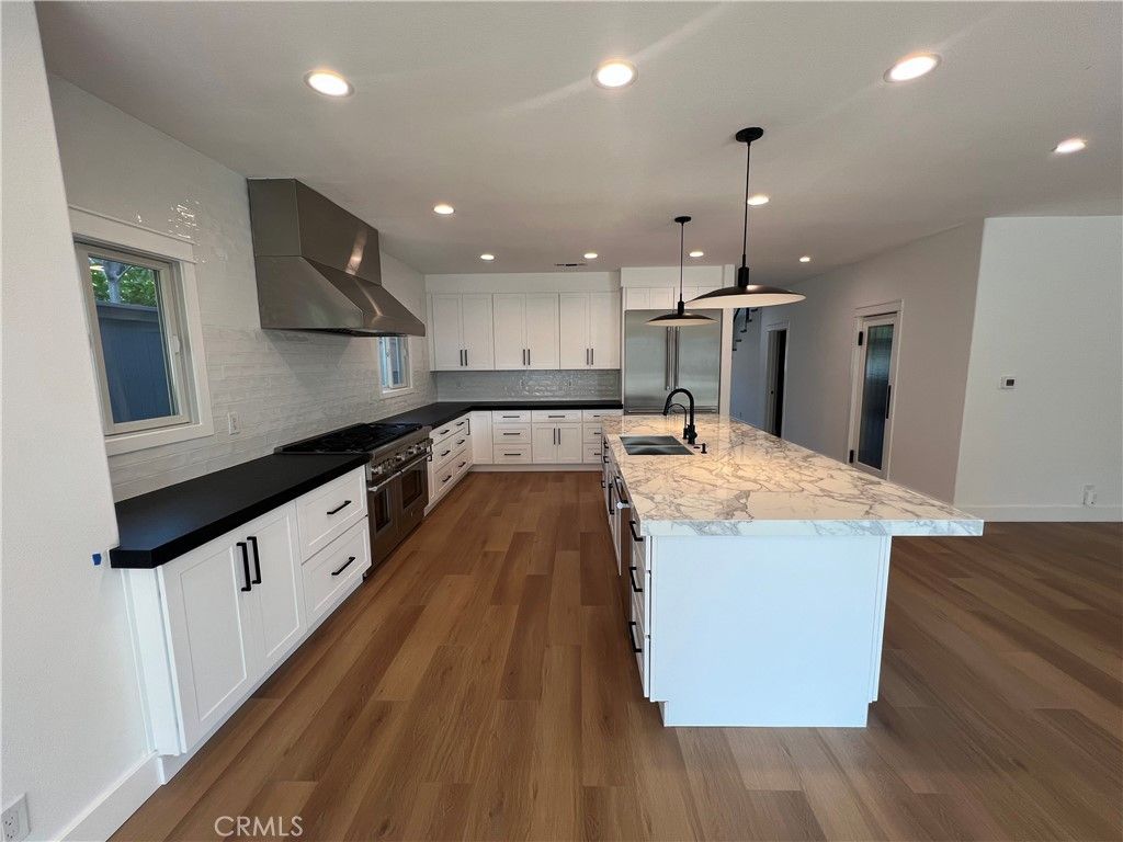 Interior, Kitchen, Pendant Lights, Recessed Lighting, Stainless Steel Appliances, Wood Texture Flooring
