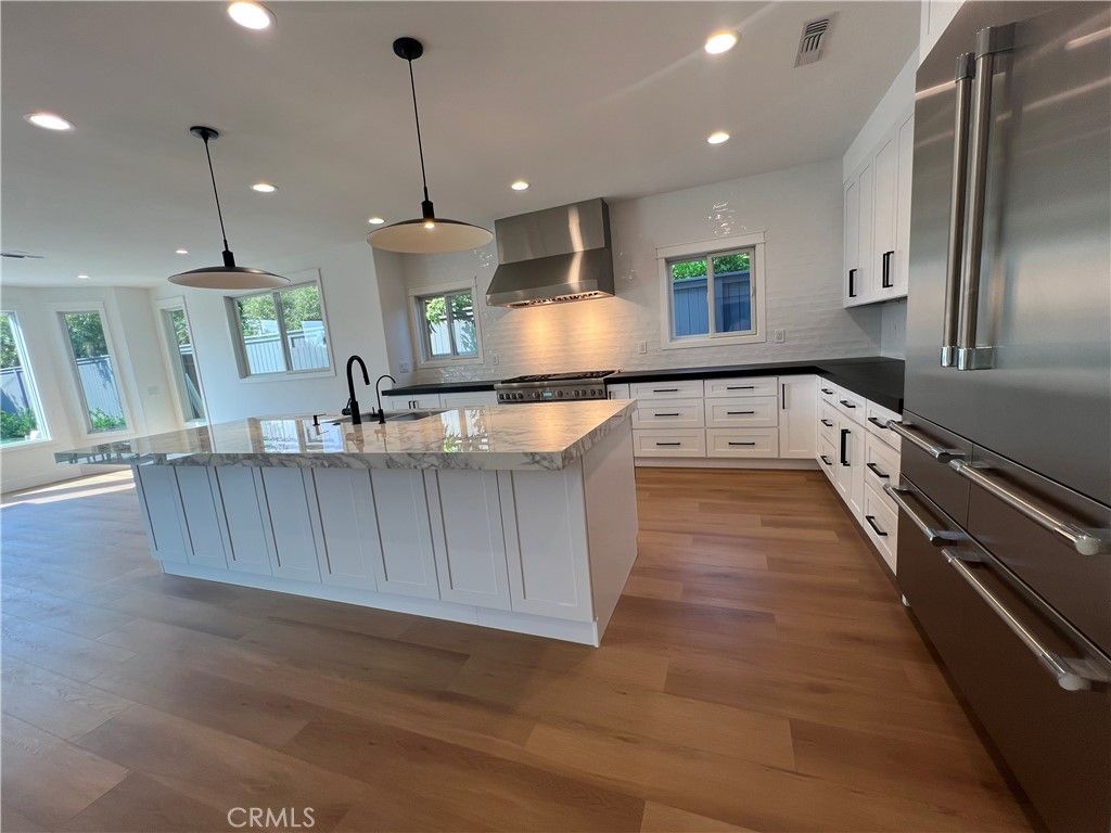 Interior, Kitchen, Pendant Lights, Recessed Lighting, Stainless Steel Appliances, Wood Texture Flooring