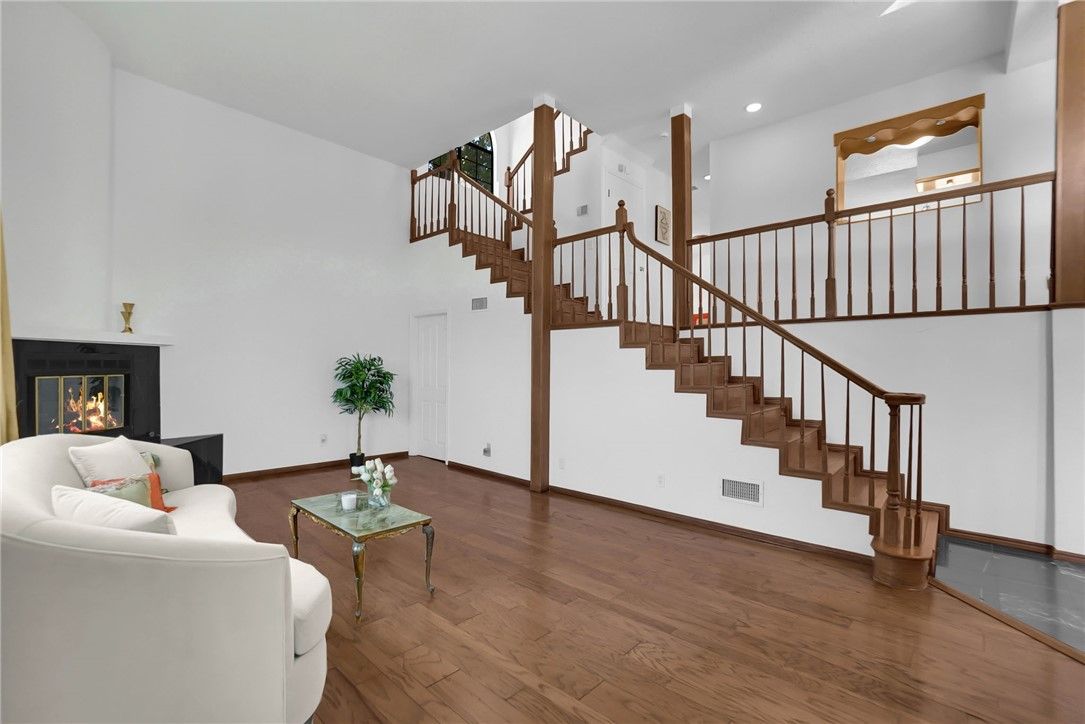 Fireplace, Interior, Living room, Recessed Lighting, Wood Texture Flooring