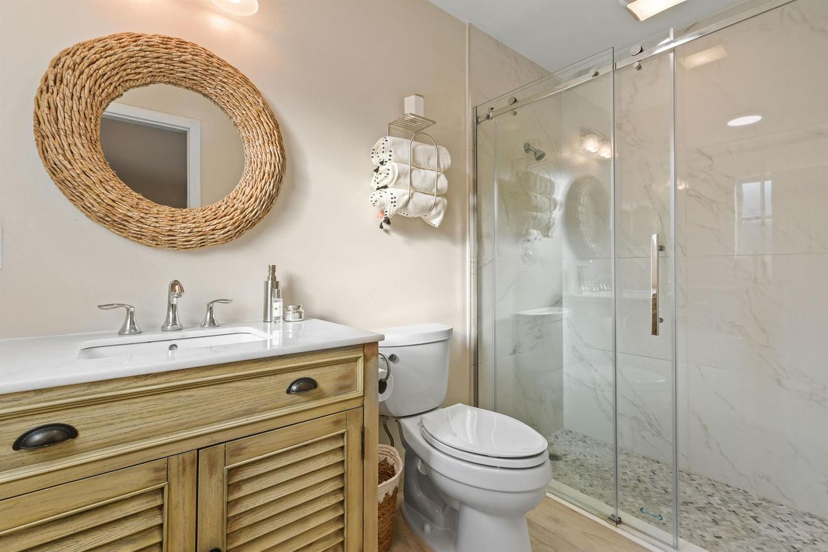 Bathroom, Glass Shower, Interior, Marble Walls, Wood Texture Flooring