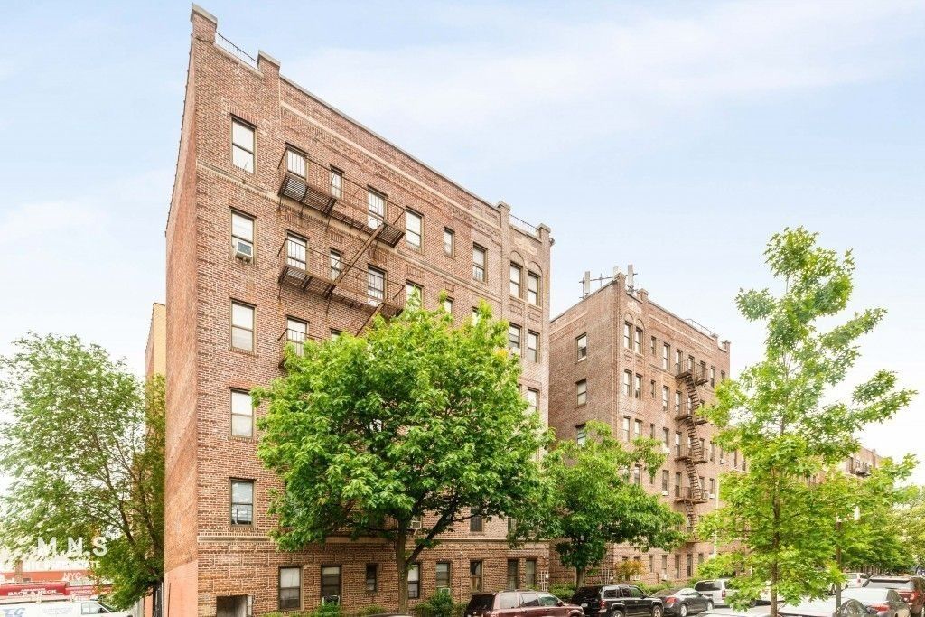 Exterior, Facade, Brick Facade, Condo Building