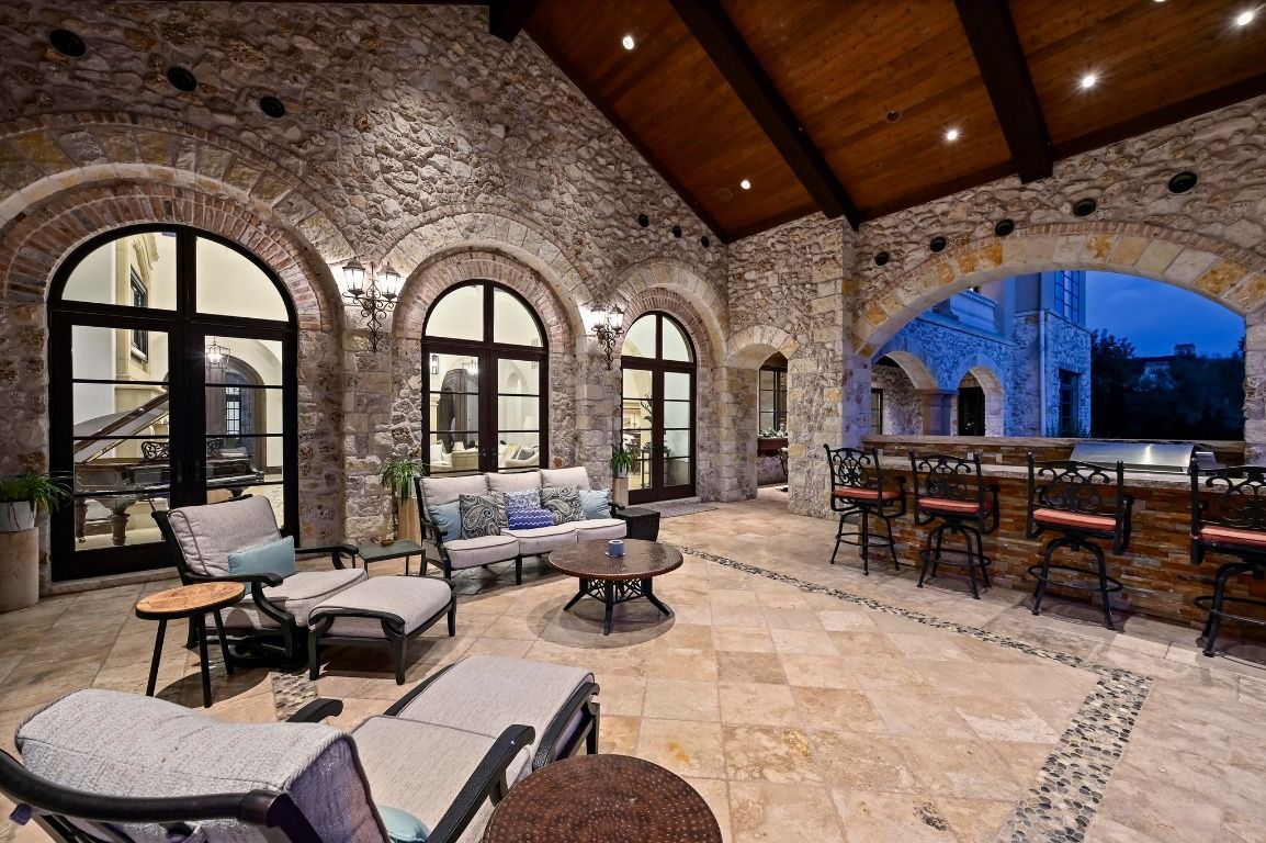 Exterior, Interior, Living room, Recessed Lighting, Stone Walls, Wooden Beams