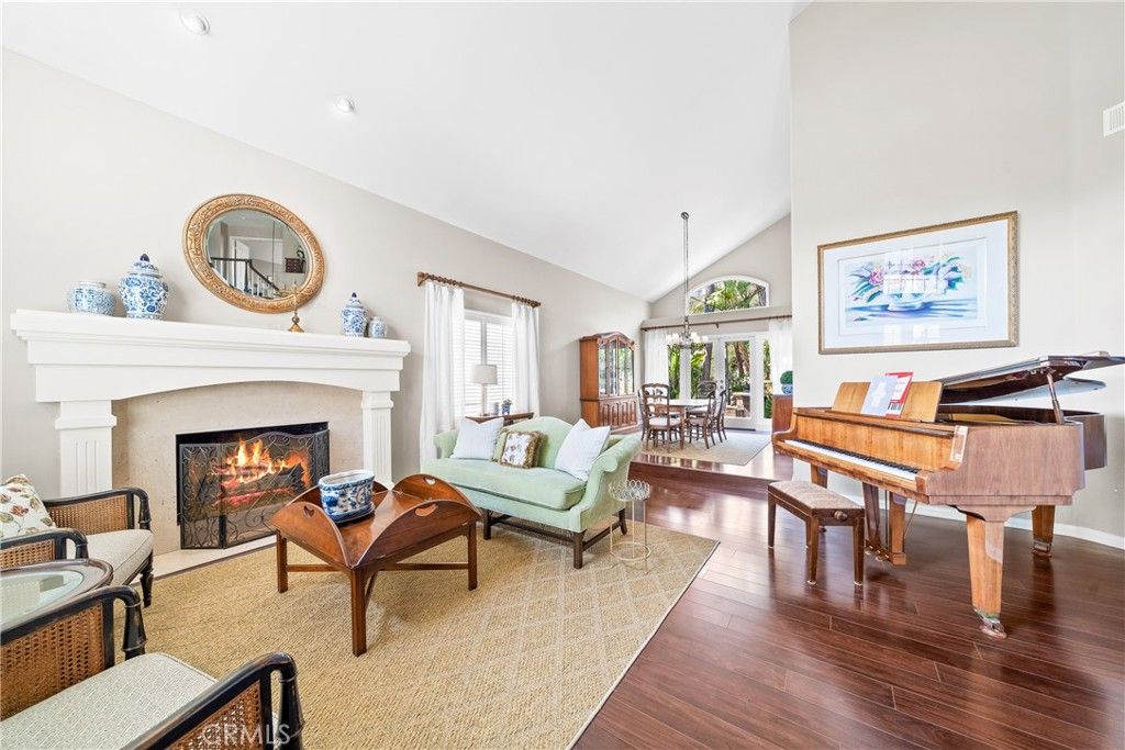 Dining room, Fireplace, Interior, Living room, Pendant Lights, Piano, Recessed Lighting, Wood Texture Flooring