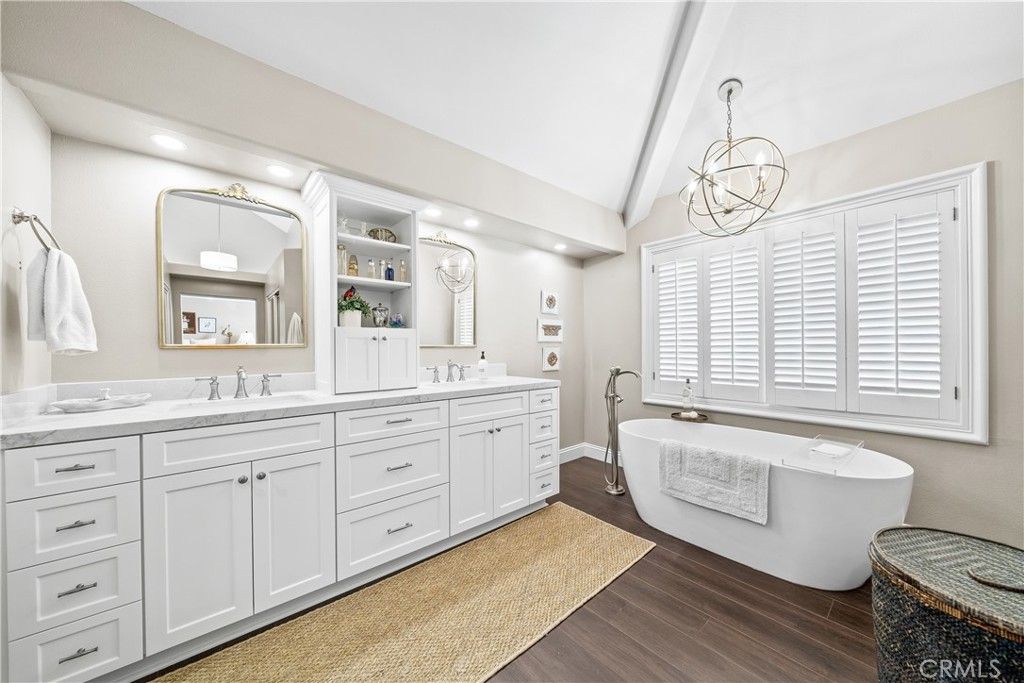 Bathroom, Chandelier, Dual Sink Vanities, Free Standing Baths, Interior, Pendant Lights, Recessed Lighting, Wood Texture Flooring