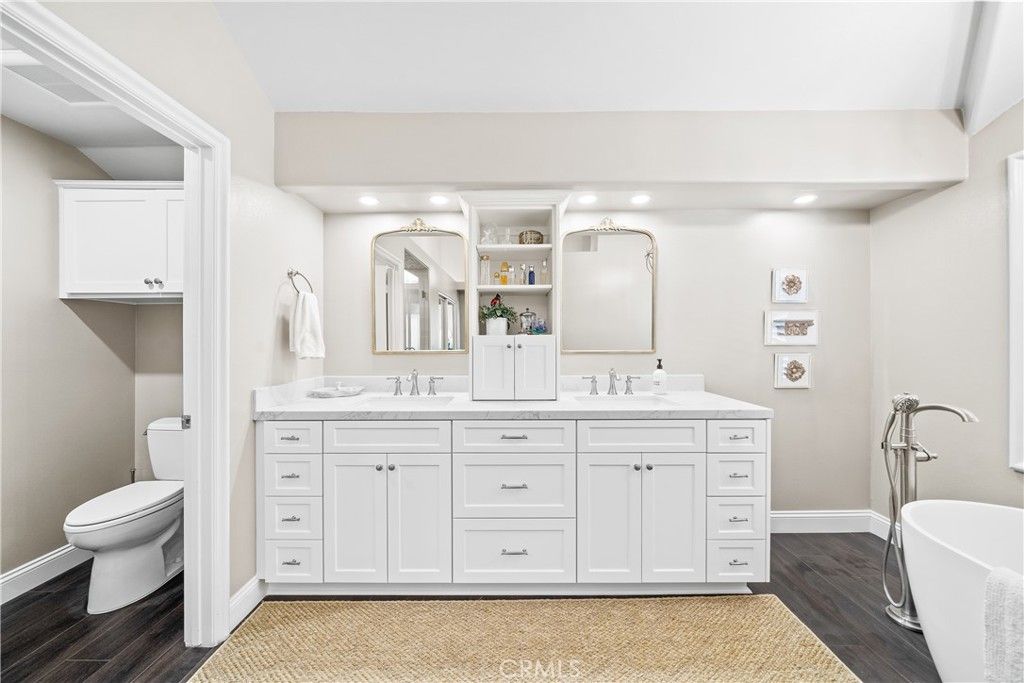 Bathroom, Dual Sink Vanities, Free Standing Baths, Interior, Recessed Lighting, Wood Texture Flooring