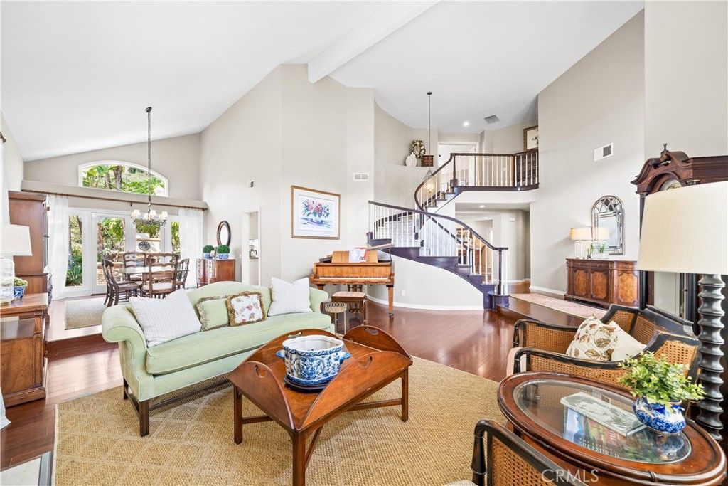 Chandelier, Dining room, Interior, Living room, Pendant Lights, Piano, Recessed Lighting, Wood Texture Flooring