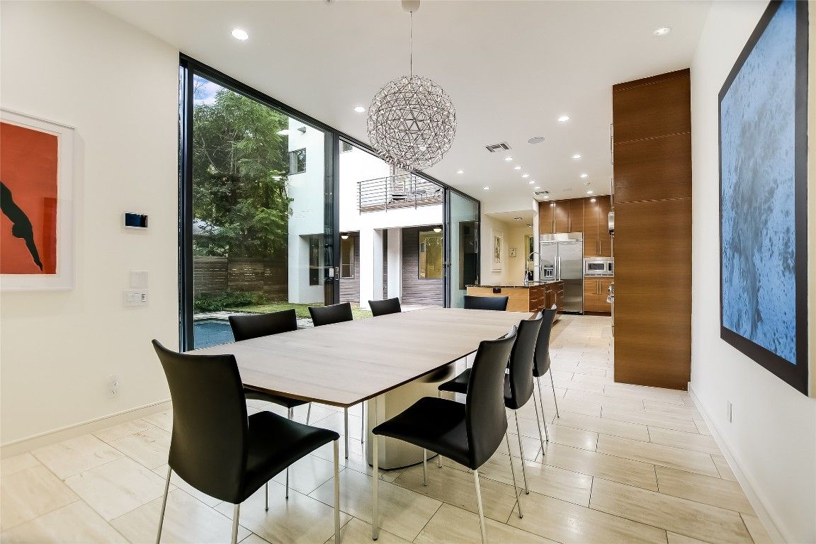 Dining room, Interior, Kitchen, Pendant Lights, Recessed Lighting, Stainless Steel Appliances, Wood Texture Flooring