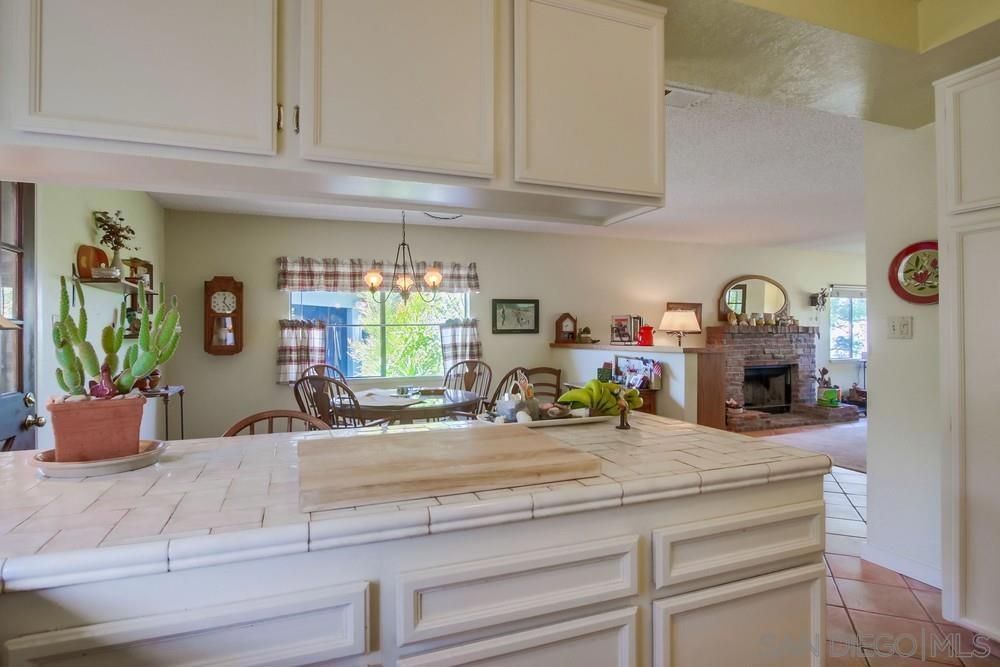 Chandelier, Dining room, Fireplace, Interior, Pendant Lights
