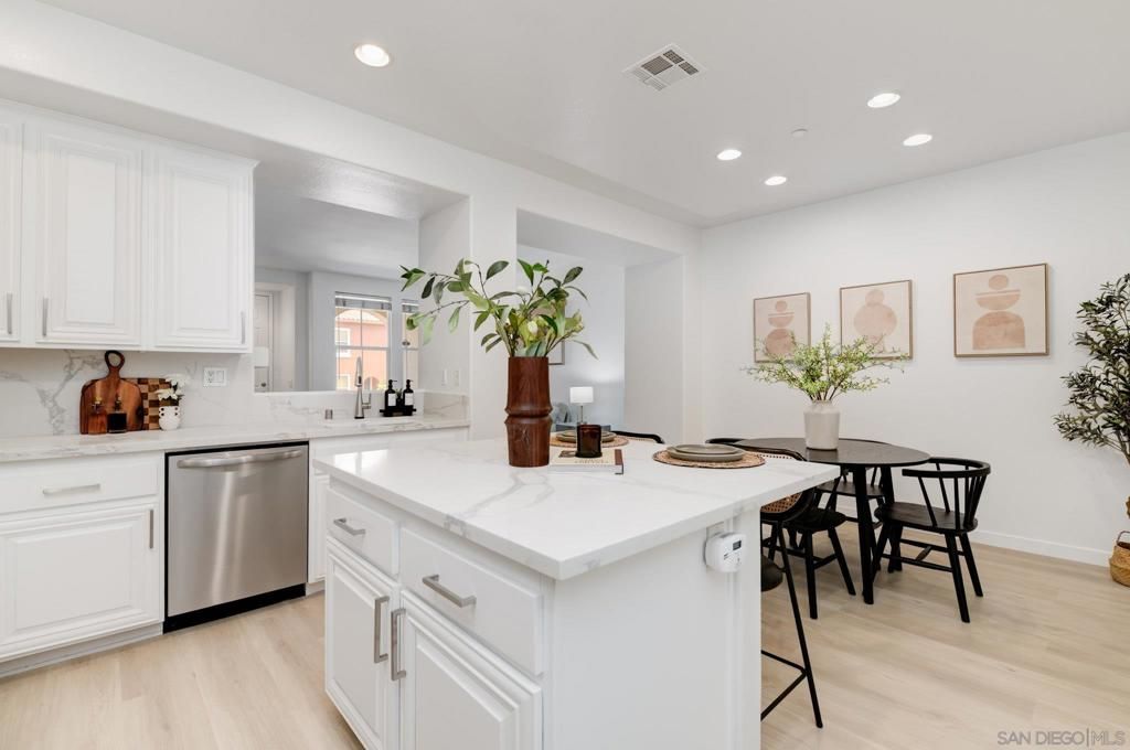 Dining room, Interior, Kitchen, Recessed Lighting, Stainless Steel Appliances, Wood Texture Flooring