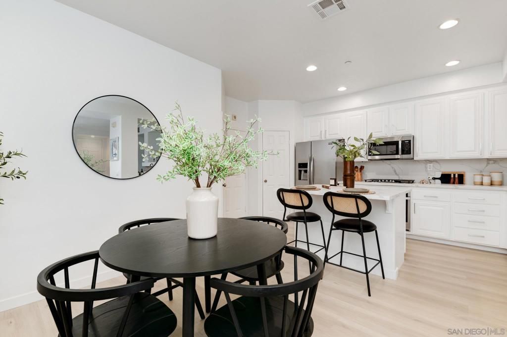 Dining room, Interior, Kitchen, Recessed Lighting, Stainless Steel Appliances, Wood Texture Flooring