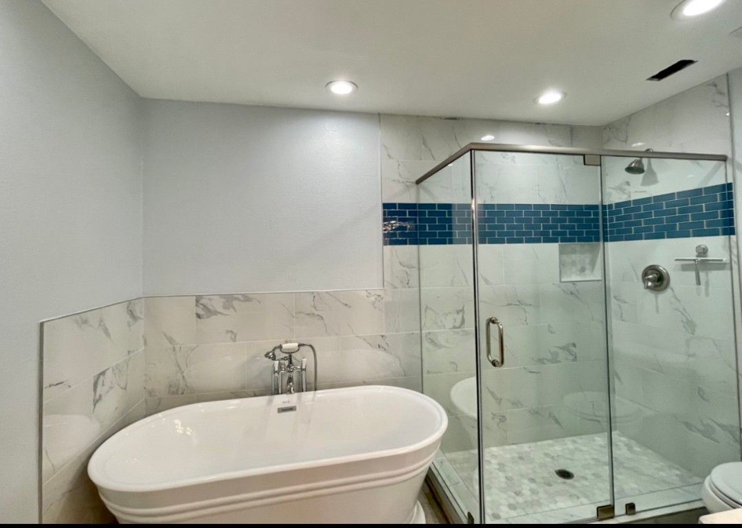 Bathroom, Free Standing Baths, Glass Shower, Interior, Marble Walls, Recessed Lighting