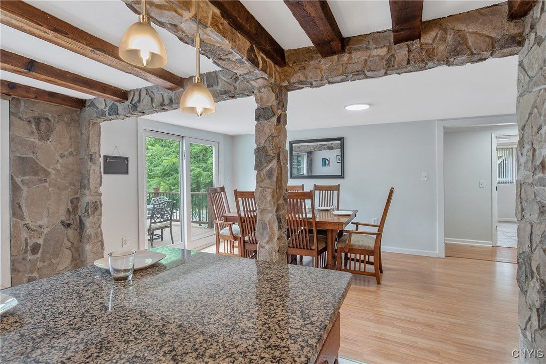 Dining room, Interior, Pendant Lights, Recessed Lighting, Stone Walls, Wooden Beams, Wood Texture Flooring