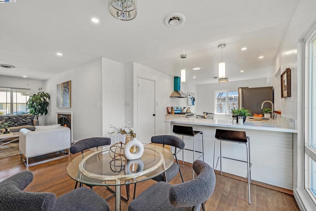 Dining room, Fireplace, Interior, Kitchen, Living room, Pendant Lights, Recessed Lighting, Wood Texture Flooring