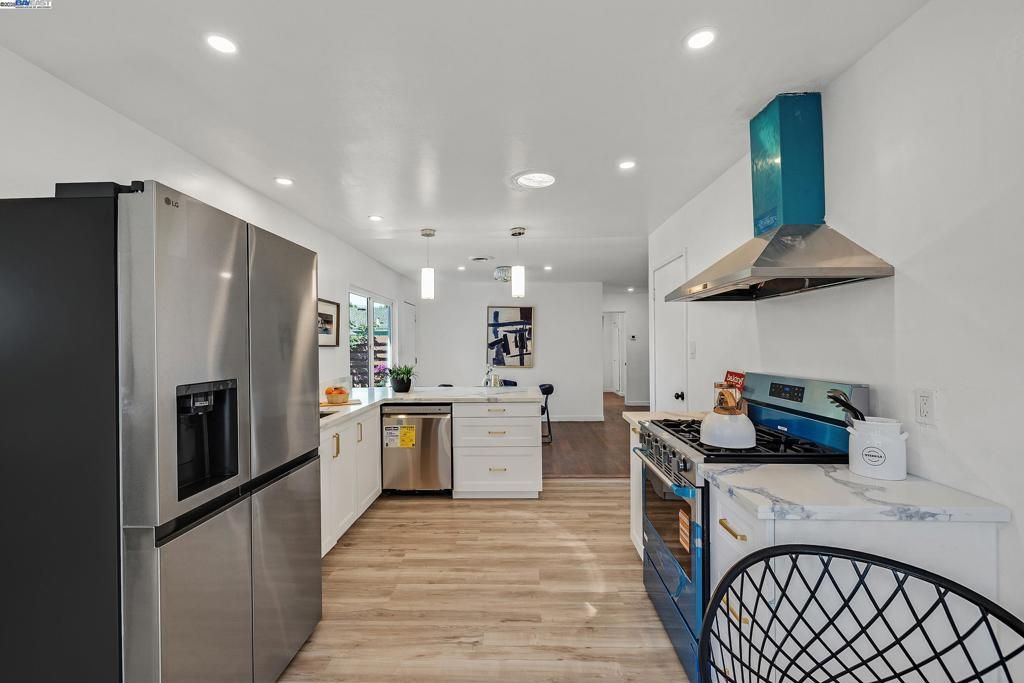 Interior, Kitchen, Pendant Lights, Recessed Lighting, Stainless Steel Appliances, Wood Texture Flooring