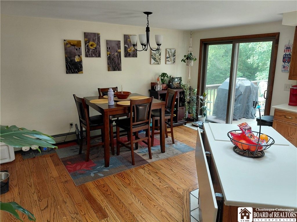 Chandelier, Dining room, Interior, Wood Texture Flooring
