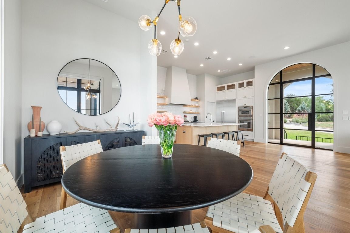 Dining room, Interior, Kitchen, Pendant Lights, Recessed Lighting, Stainless Steel Appliances, Wood Texture Flooring